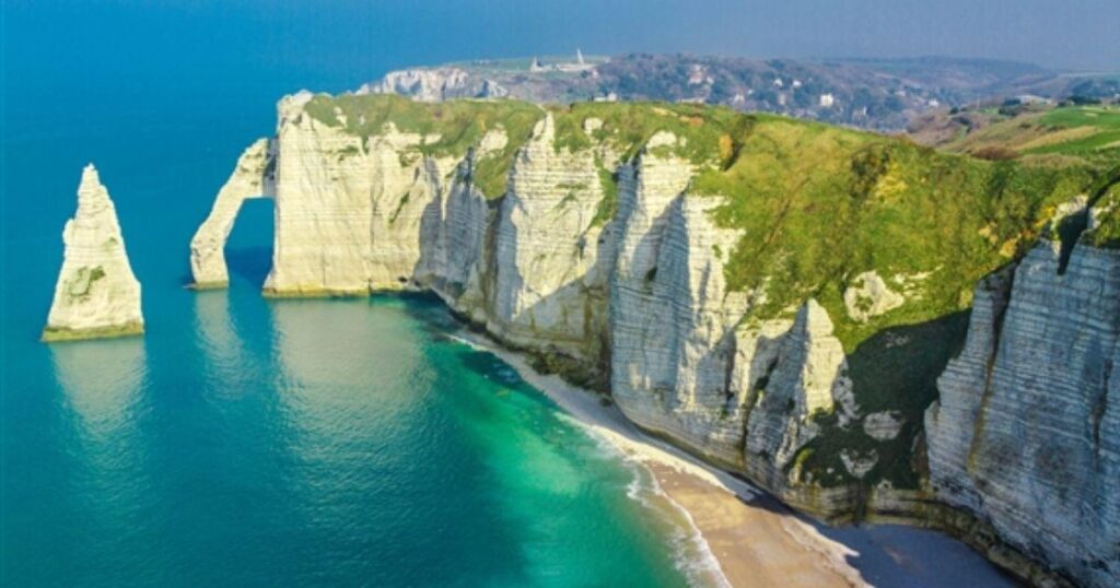 Etretat Cliffs: Nature's Spectacular Canvas + Exploring Normandy's Charms: Guide to 15 Enchanting Spots